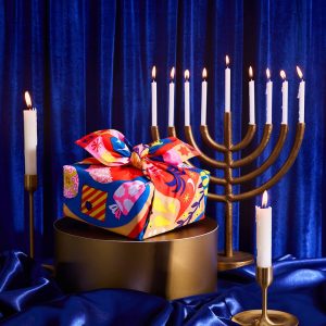 The Eighth Flame Knot Wrap 100% organic cotton, a 70cm x 70cm Knot Wrap